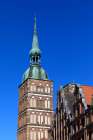 Germany, Mecklenburg-Vorpommern, Stralsund. Copper steeple of Saint Nicholas Church, UNESCO Site. Art Print